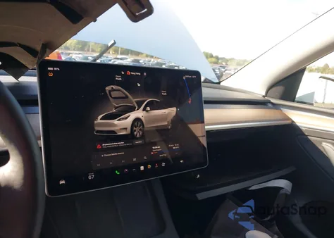 2023 Tesla Model Y Awd/Long Range Dual Motor All-Wheel Drive z USA, uszkodzony, nr VIN 7SAYGDEE5PF755573